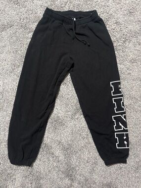 PINK women’s black sweatpants with white embroidered logo